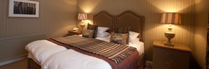 A kingsize bedroom at the Burts Hotel in Melrose