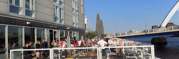 The outside terrace of the Hilton Garden Inn Glasgow City Centre by the River Clyde