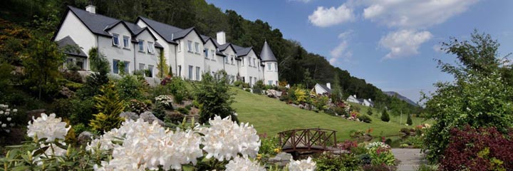 An exterior view of Loch Ness Lodge guest house and gardens