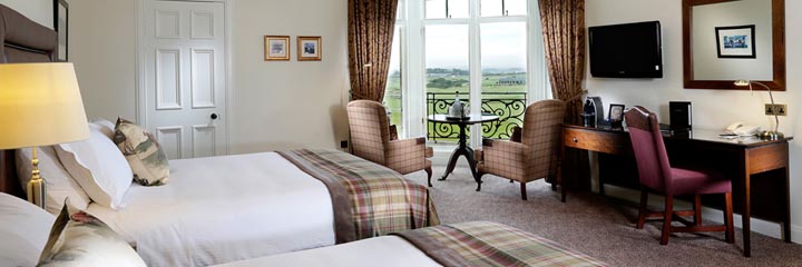A feature bedroom overlooking the Old course at the Macdonald Rusacks Hotel, St Andrews
