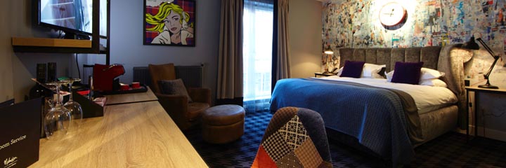 A bedroom at the Malmaison Glasgow Hotel