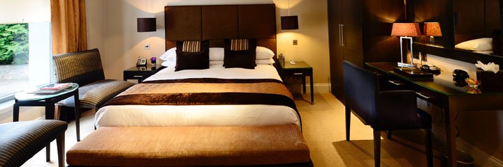 A double bedroom at the 5 star Rocpool Reserve Hotel in Inverness