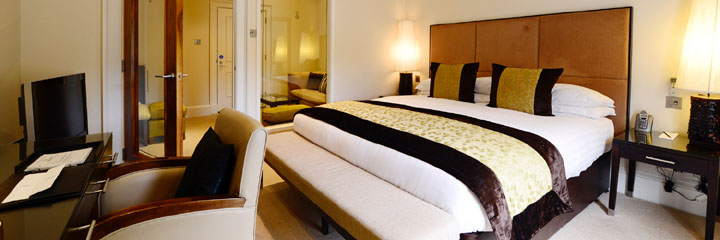 A luxurious double bedroom at the 5 star Rocpool Reserve Hotel in Inverness