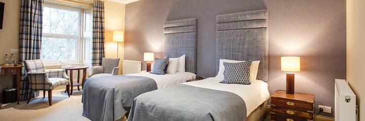 A stylish twin bedroom at the 4 star Royal Golf Hotel in Dornoch in the north of Scotland.
