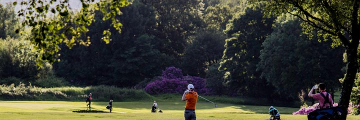 Golfers on the 12th hole of the championship course at Cawder Golf Club