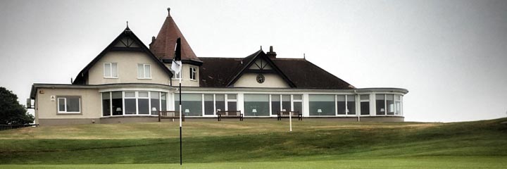 Lundin Golf Club clubhouse, sitting behind the 18th green