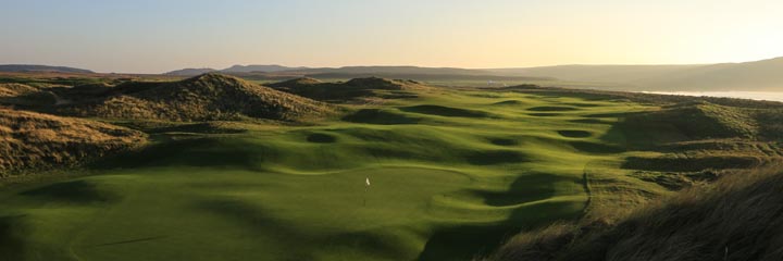 A view across the Machrie Links on Islay, showing the classic undulations for links golf and the mounds of grassy sand dunes that line some of the holes 