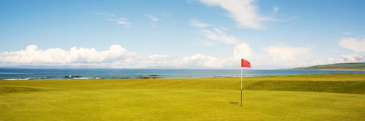 The championship links course at Machrihanish Golf Club sits on the coast with views to Islay and Jura