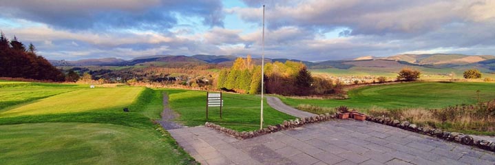 The 1st tee at Moffat Golf Club with views across the Southern Upland hills