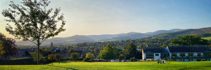 A view across Peebles golf course and the clubhouse to the hills beyond