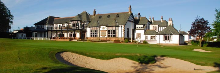 The 18th green and clubhouse at Royal Burgess Golf Club