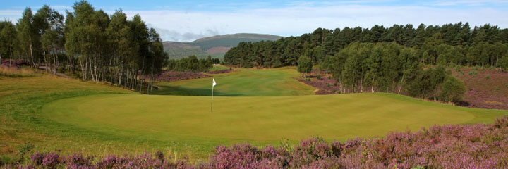 A view down the 11th hole at the Spey Valley golf course near Aviemore, looking from the green with the hills in the background
