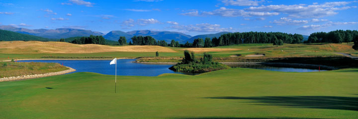 The 16th green at Spey Valley golf course near Aviemore, with the water hazard behind and the mountains as a backdrop